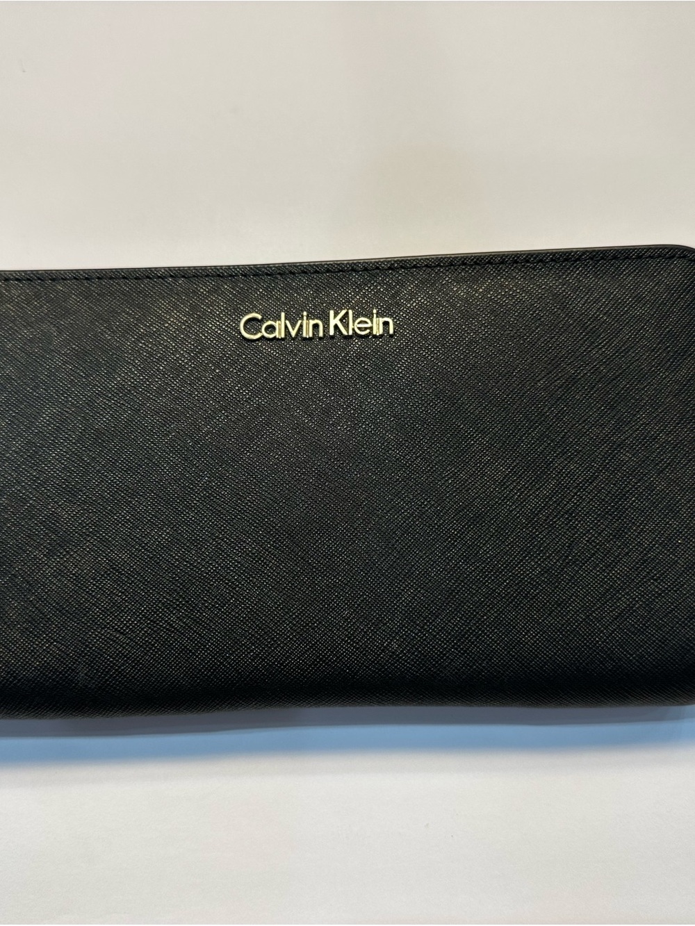 Calvin Klein Black Saffiano Leathwr Zip Around Wristlet/Wallet with Gold Logo